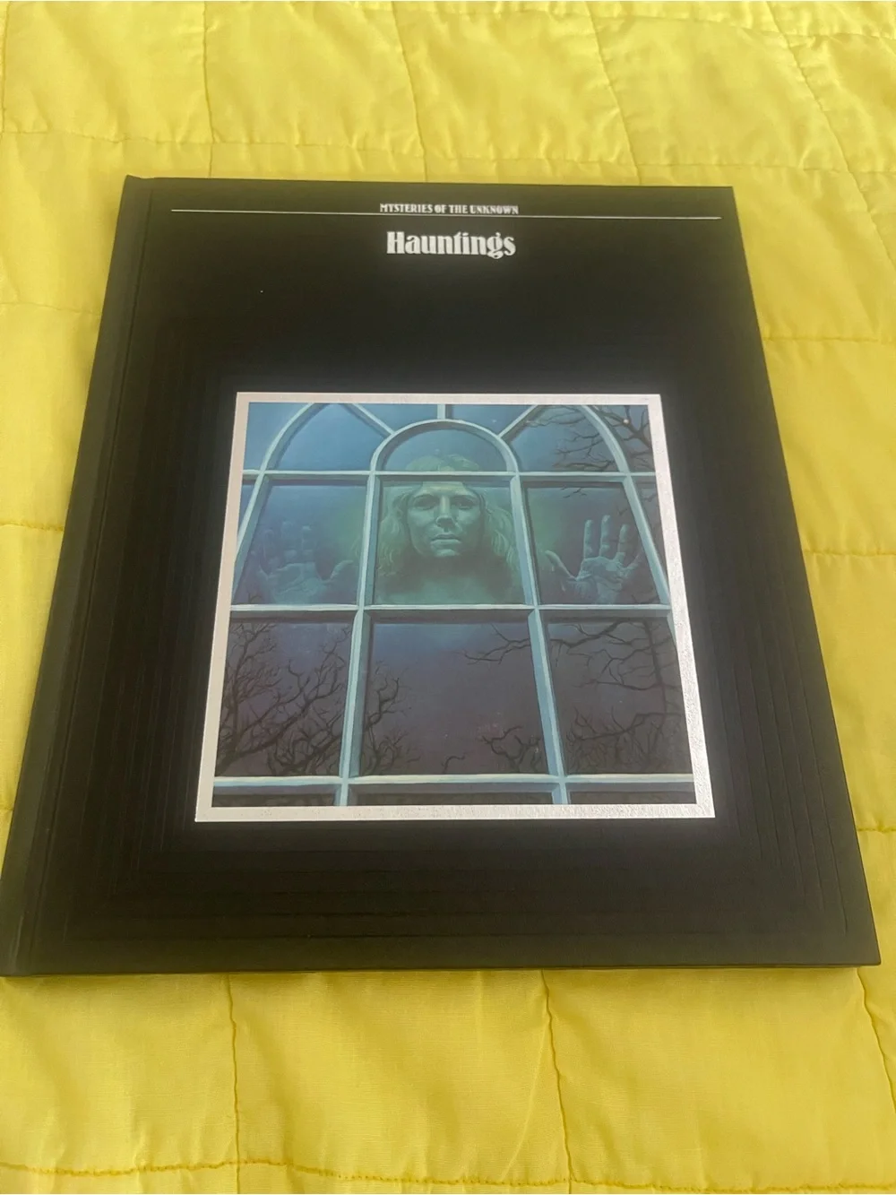 Hauntings Hardcover Book - Black & Teal Cover